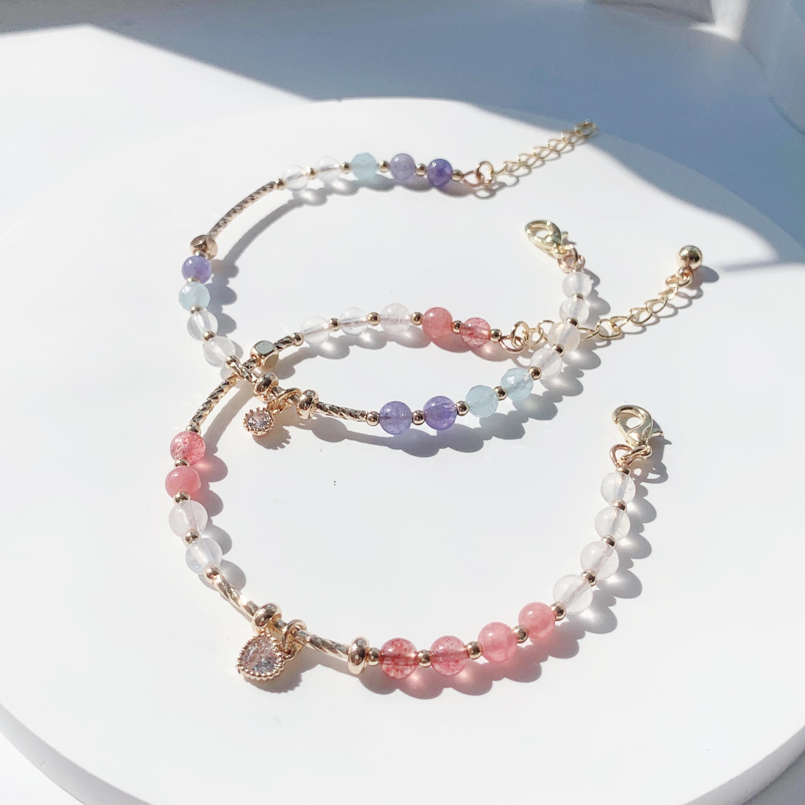 Blonde gold crystal, sun pink crystal, aquamarine, moonstone, rhodolite, strawberry crystal, tanzanite gradient color series, 14k gold-filled bracelet