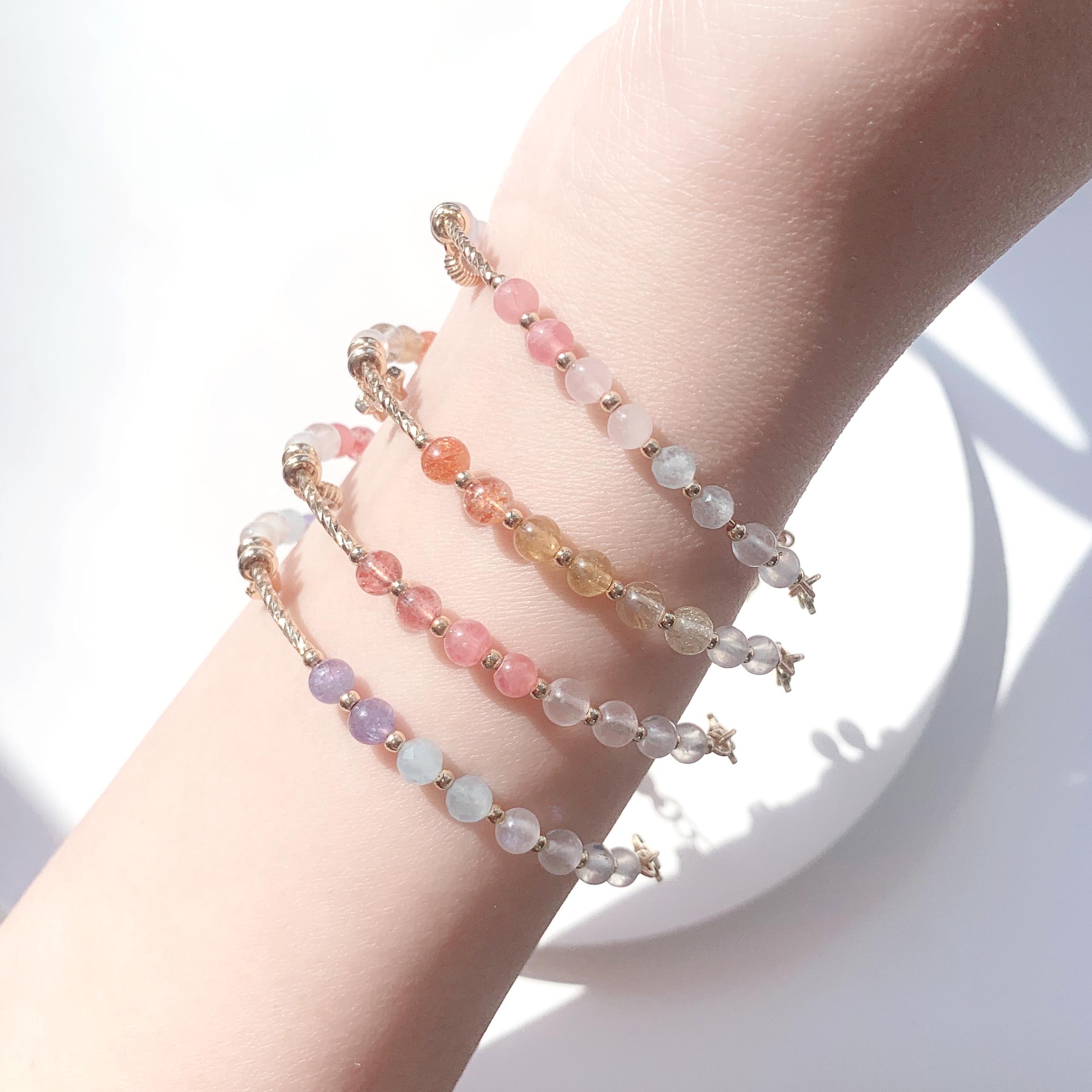 Blonde gold crystal, sun pink crystal, aquamarine, moonstone, rhodolite, strawberry crystal, tanzanite gradient color series, 14k gold-filled bracelet