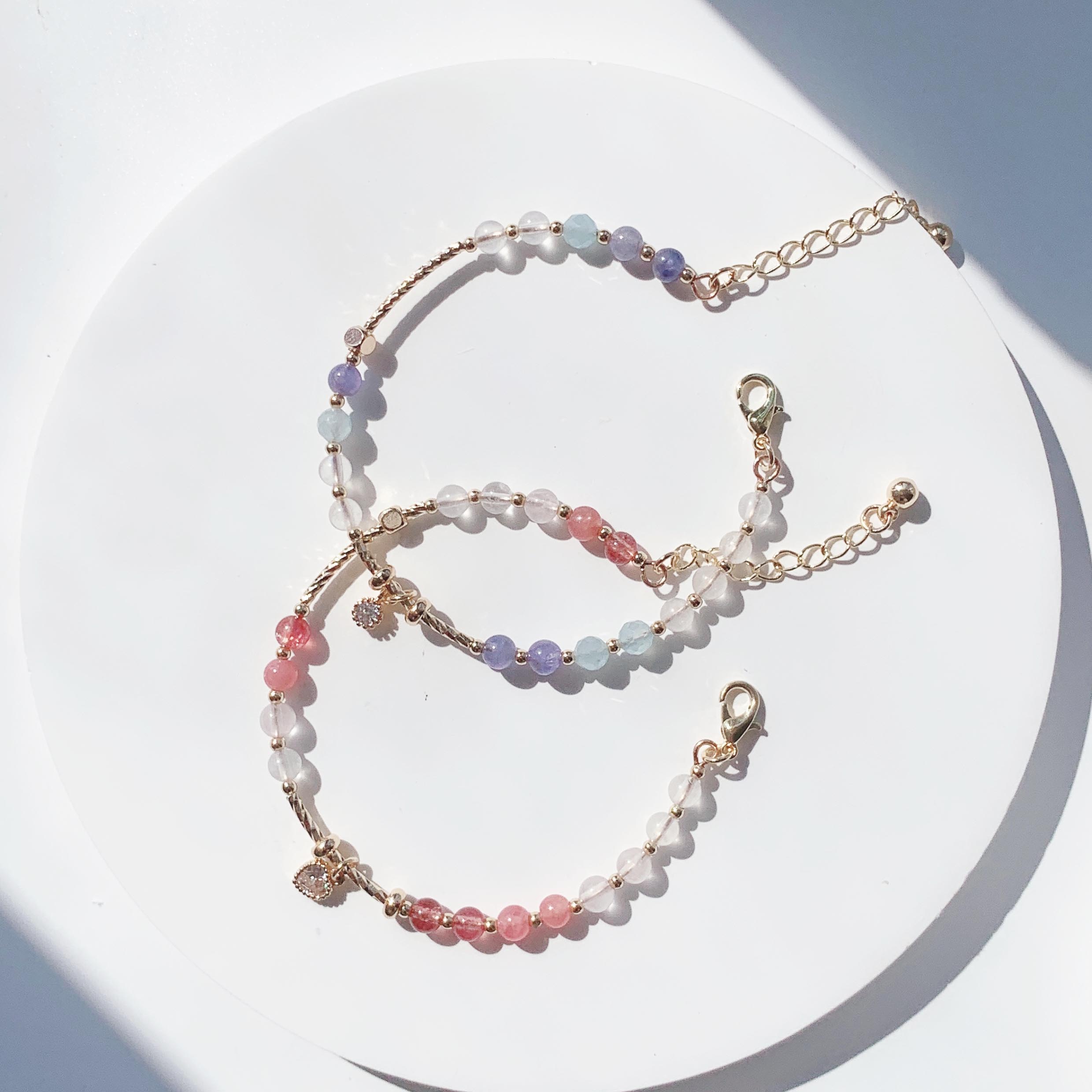 Blonde gold crystal, sun pink crystal, aquamarine, moonstone, rhodolite, strawberry crystal, tanzanite gradient color series, 14k gold-filled bracelet