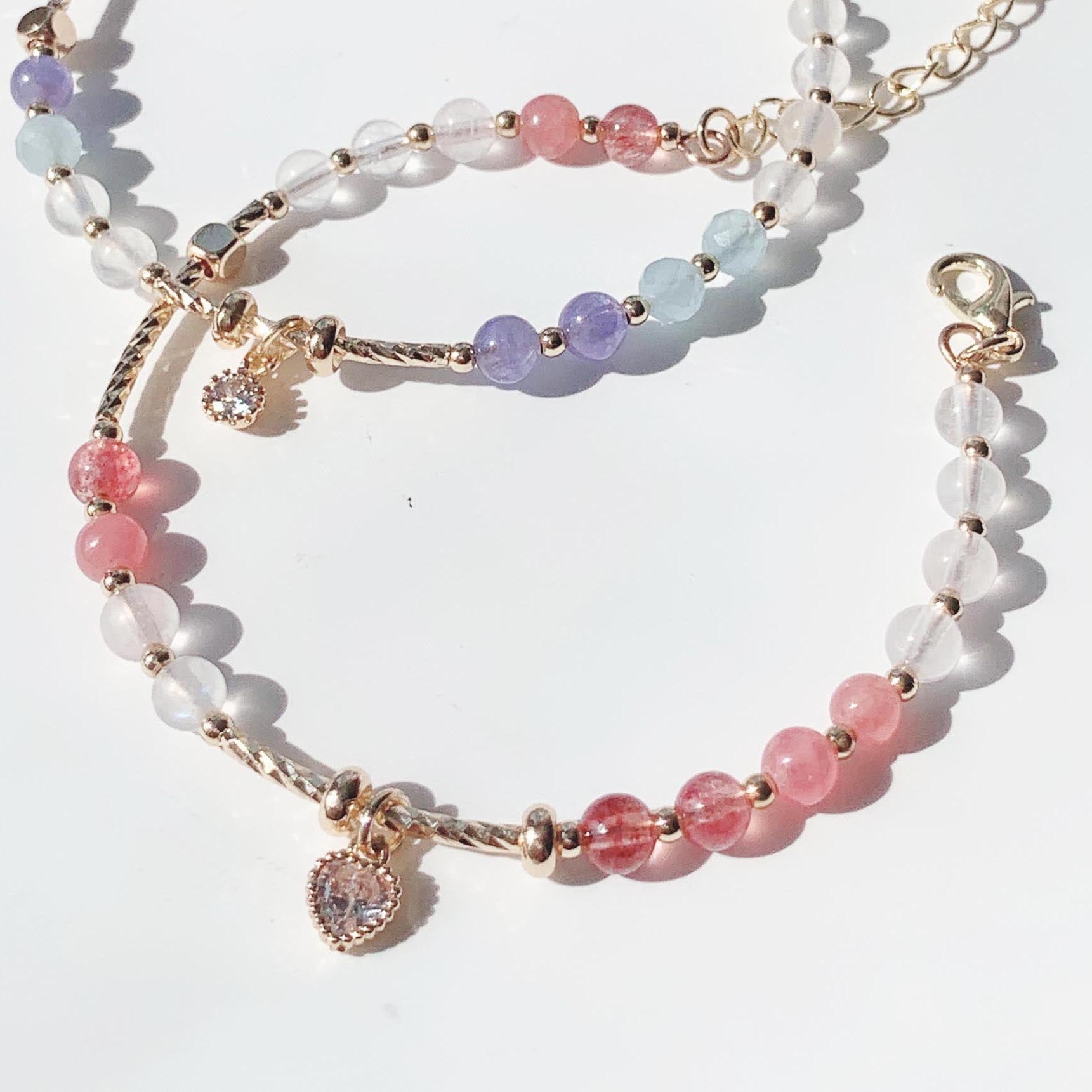 Blonde gold crystal, sun pink crystal, aquamarine, moonstone, rhodolite, strawberry crystal, tanzanite gradient color series, 14k gold-filled bracelet