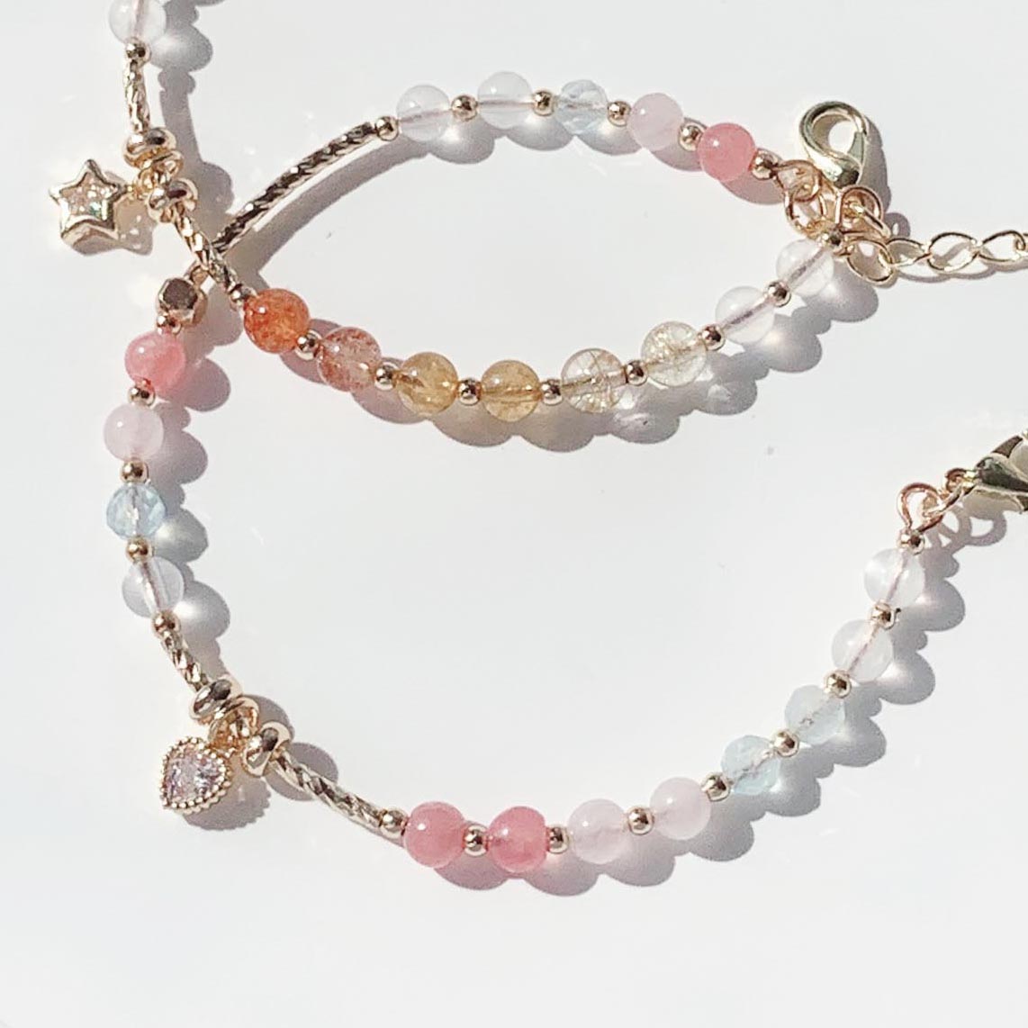 Blonde gold crystal, sun pink crystal, aquamarine, moonstone, rhodolite, strawberry crystal, tanzanite gradient color series, 14k gold-filled bracelet